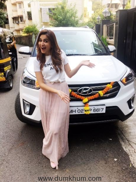 Krti Kharbanda gifts herself a swanky car!