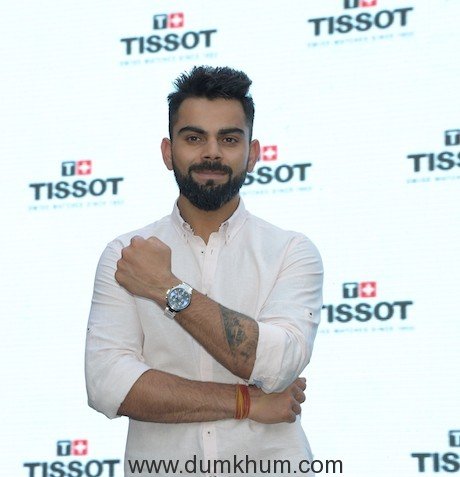 Brand Ambassador Virat Kohli posing with his Tissot watch at the Opening of the New Tissot Boutique at Palladium Mall