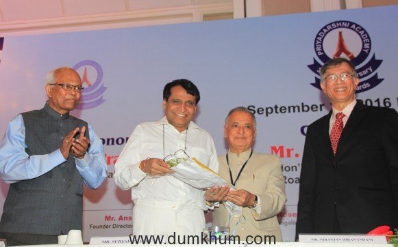 mr-nanik-rupani-felicitating-honorable-minister-mr-suresh-prabhu-at-32nd-priyadarshani-global-awards
